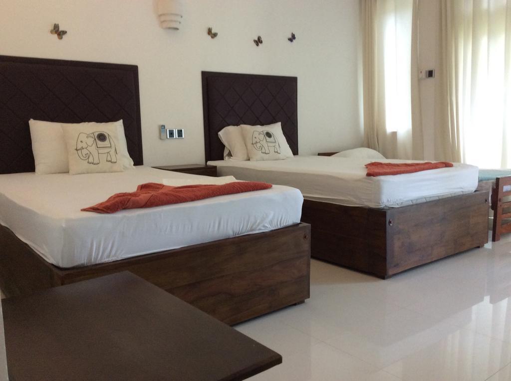 מיריסה Lemazone Inn חדר תמונה